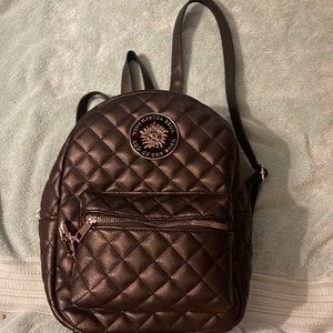 Supernatural black quilted backpack